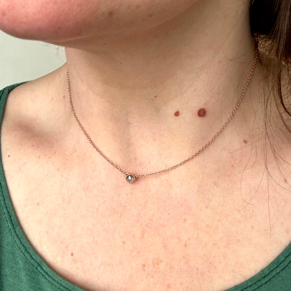 Floating Diamond Necklace 14K Gold salt and pepper Diamond bezel set solitaire necklaces rustic Diamond jewelry handmade solid gold jewelry sustainable 14K Rose Gold on model