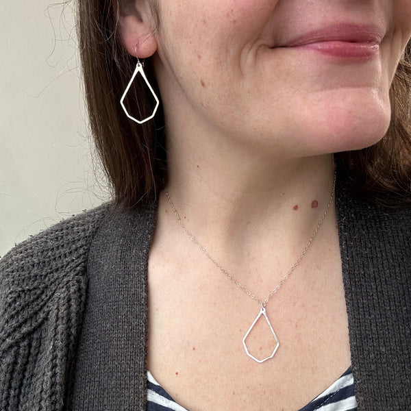 Never apart earrings geometric teardrop earring half heart earrings best friend split heart jewelry gold heart earrings on model with matching split heart necklace best friend jewelry