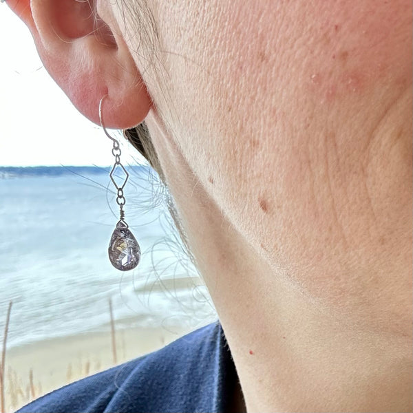 harpoon earrings handmade gemstone earrings moss amethyst earring super 7 purple gem ear rings sustainable jewelry on model