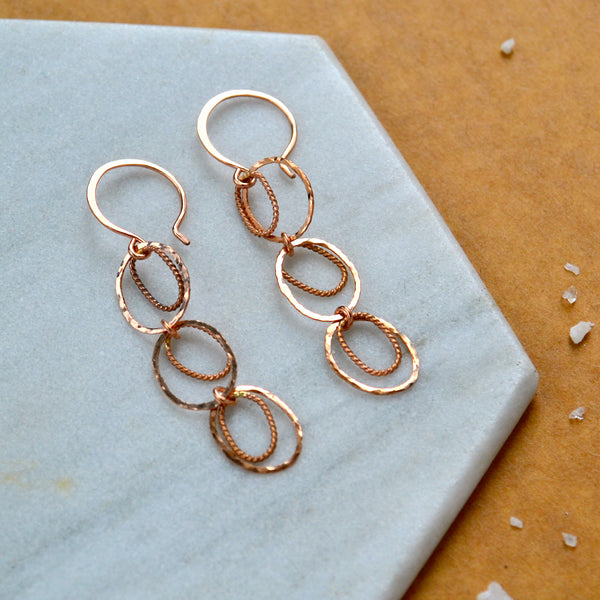 rose gold skipping stones earrings long dangle ear rings with concentric circles handmade earrings sustainable jewelry