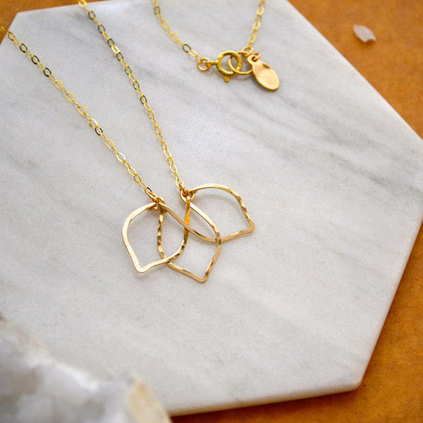 Lotus Necklace - shimmering lotus blossom silhouette pendant necklace - Foamy Wader