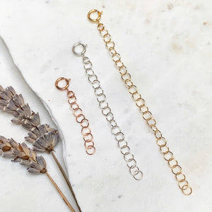Jewelry extender. lightweight dainty custom chains sustainably made in the USA on Whidbey Island. high-quality demi-fine precious metals of Gold Fill, Rose Gold Fill, and Sterling Silver all Nickel-free, water resistant