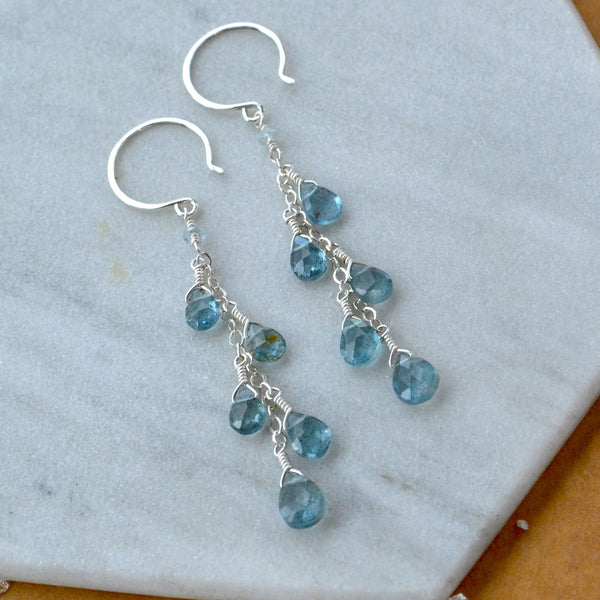 Aquamarine earrings in Sterling Silver on a marble surface