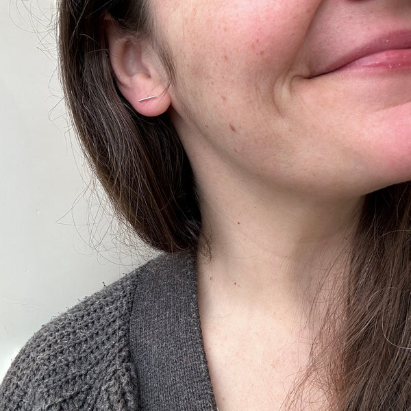 Pillar Stud Earrings on model simple bar earrings 10mm staple post earrings silver line studs handmade sustainable earrings