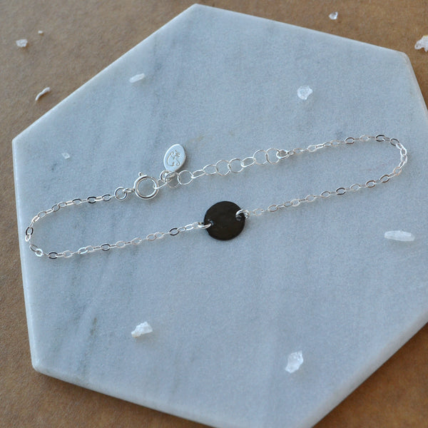 Speckle Bracelet dainty charm bracelets pounded disc charm dappled circle delicate bracelet mixed metal black oxidized silver