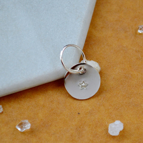Tiny Star charm pendant with five pointed star image silver